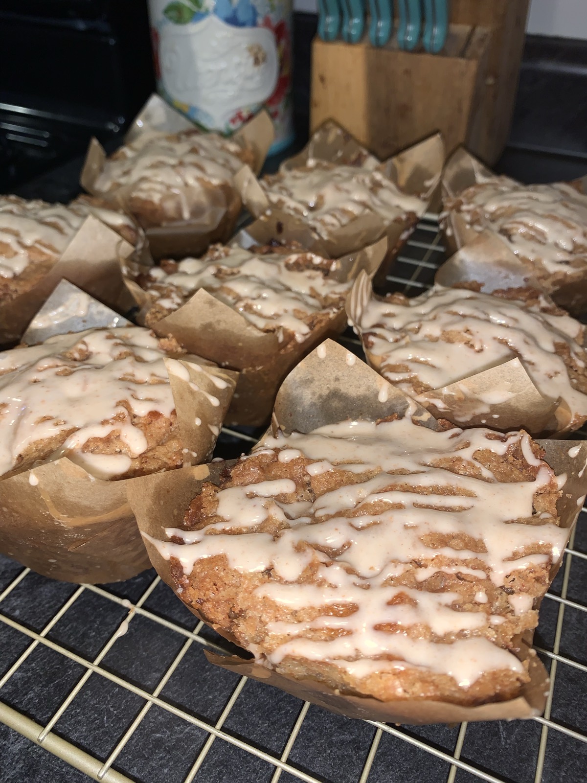 Coffee cake sourdough banana bread muffins topped with cinnamon glaze